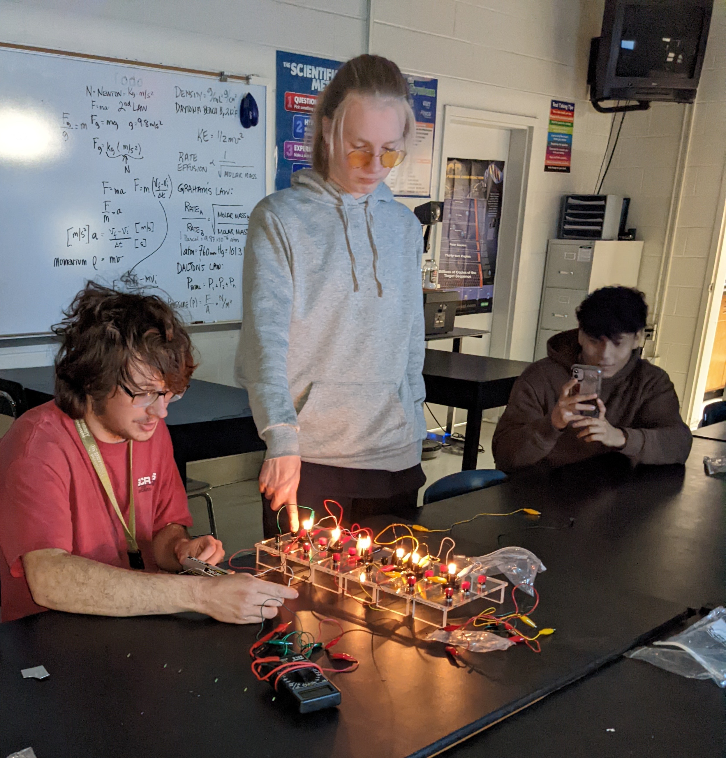Students at Petersburg High School create electricity as they learn about wind power and renewable energy.,Students at Petersburg High School create electricity as they learn about wind power and renewable energy.